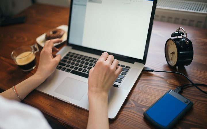 Laptop with an external backup hard drive plugged in