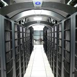 Long aisle of server racks in a cloud data center
