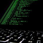 Ransomware source code displayed on a screen