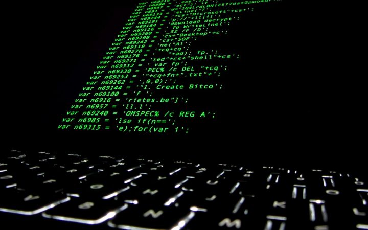 Ransomware source code displayed on a screen