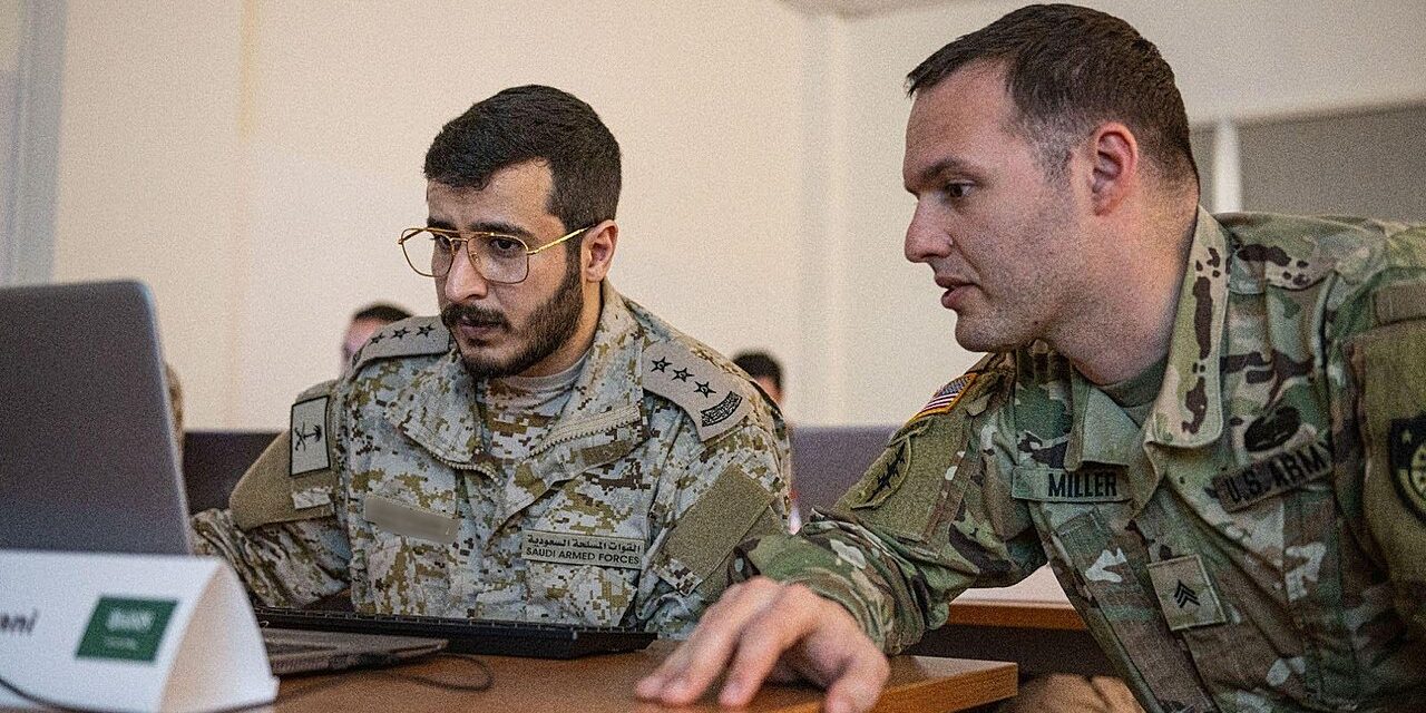 Participants collaborating during a cybersecurity training exercise