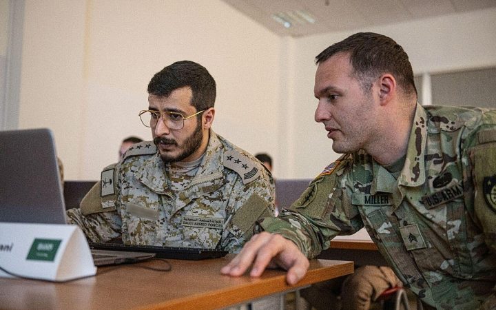 Participants collaborating during a cybersecurity training exercise